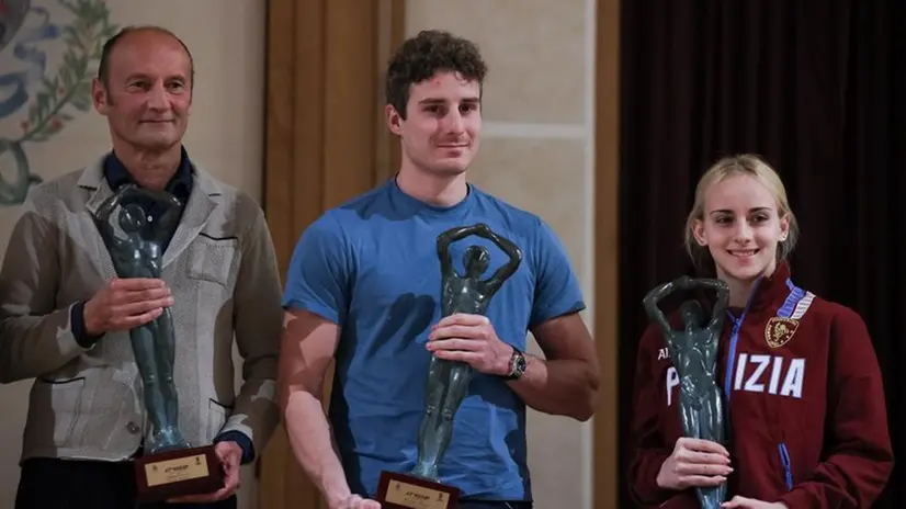 La consegna degli Oscar ai tre vincitori