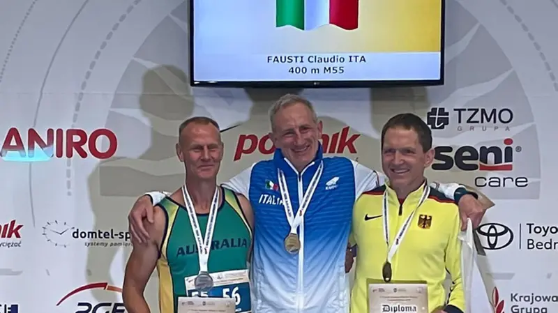 Il podio dei 400 m con Claudio Fausti