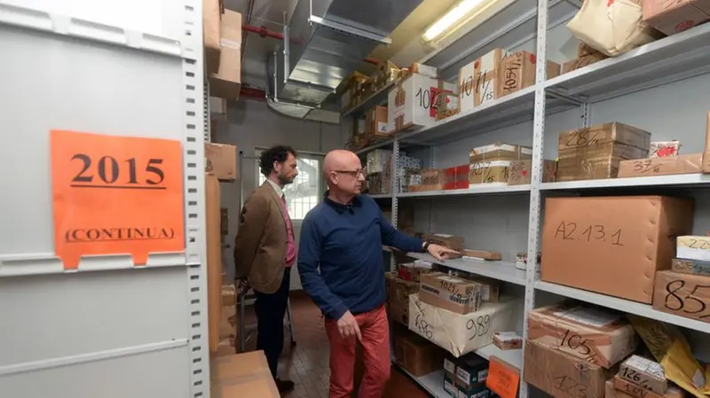 Fabrizio Meli e Andrea Cittadini nel caveau - Foto Marco Ortogni Neg © www.giornaledibrescia.it