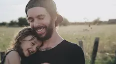 Un papà con la figlia