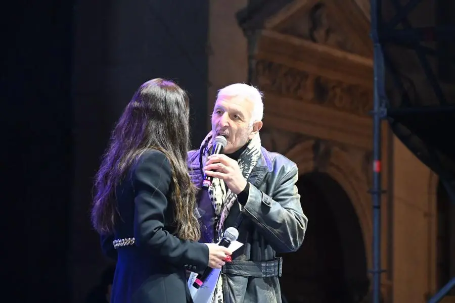 Diego Spagnoli e gli ospiti sul palco in piazza Loggia