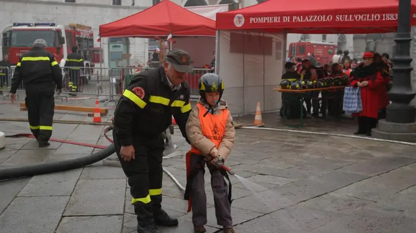 Pompieropoli in piazza Loggia in uno scatto di una passata edizione - © www.giornaledibrescia.it