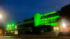 Il Comando provinciale dei Vigili del Fuoco di via Scuole a Brescia illuminato di verde
