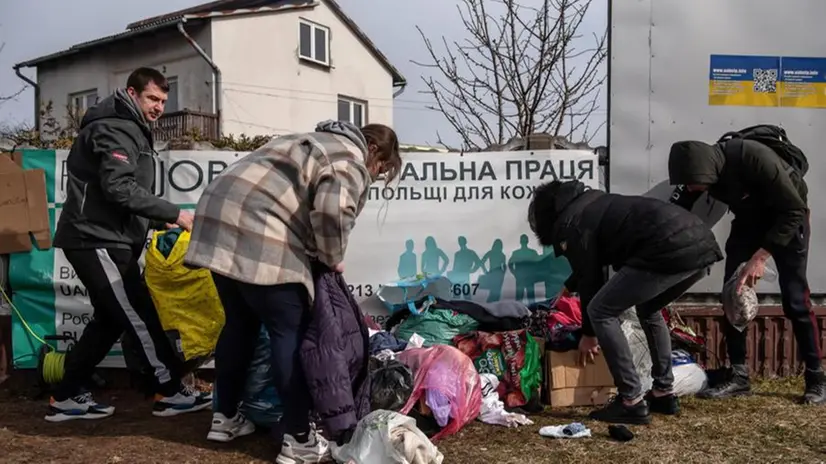 Profughi al confine tra Ucraina e Polonia