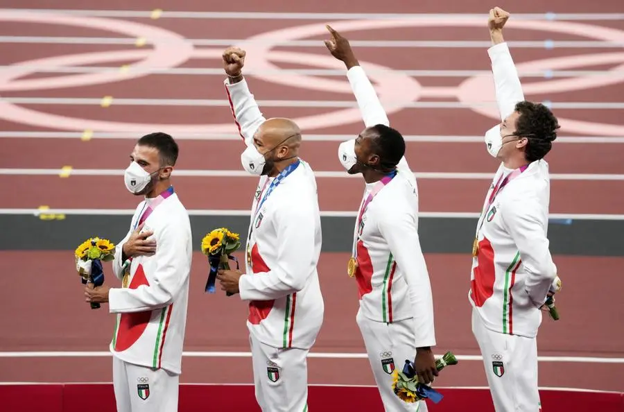 Jacobs e compagni, la staffetta d'oro del 4x100 - Foto Ansa © www.giornaledibrescia.it