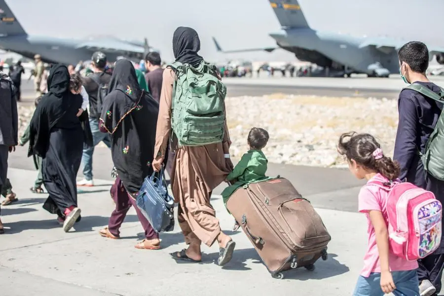 Afghani in fuga a Kabul
