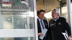 Il premier Giuseppe Conte e Agostino Miozzo nella sede operativa della Protezione Civile - Foto Ansa/Giuseppe Lami