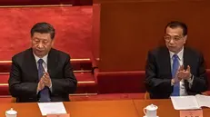 Il presidente cinese Xi Jinping e il primo ministro Li Keqiang - Foto Ansa