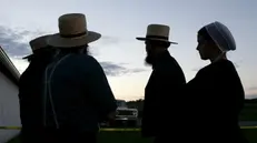 Un gruppo di uomini appartenenti alla comunità Amish