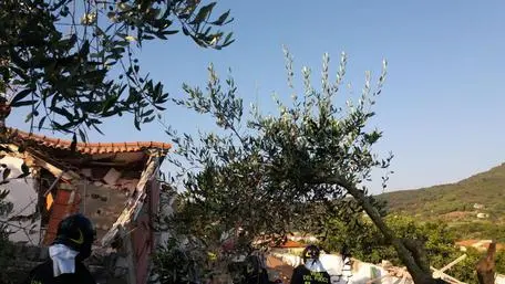 La palazzina esplosa - Foto Ansa © www.giornaledibrescia.it