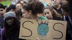 Studenti alla marcia per il clima a Lisbona - Foto Ansa/Ap Armando Franca - Copyright 2019 The Associated Press