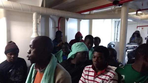 Alcuni migranti a bordo della Sea Watch - Foto Ansa