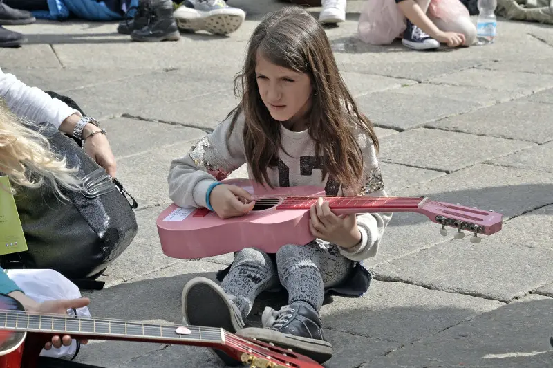 Mille chitarre in piazza Loggia