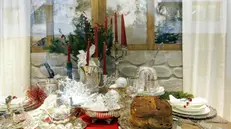 Una tavola imbandita per il Natale - Foto © www.giornaledibrescia.it