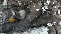 Gli scarponi dell'alpino Rodolfo Beretta, restituiti assieme al suo corpo dai ghiacci dell'Adamello - © www.giornaledibrescia.it