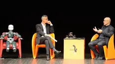 Sul palco a Trento. In tre sul palco: Icub, Massimo Mazzalai e Roberto Cingolani