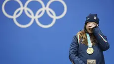 Sofia Goggia sul podio con la medaglia d'oro - Foto Ansa -  © www.giornaledibrescia.it