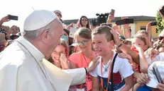 La gioia dei bambini per l'incontro con il Papa