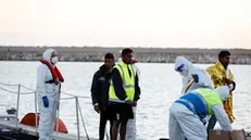 The 17 migrants who survived the shipwreck of 12 March 2023 off the Libyan coast are welcomed in the port of Pozzallo, Sicily, Italy, 13 March 2023. The survivors, all originally from Bangledesh, were transhipped on Coast Guard patrol boats by the merchant ship "Froland", which had rescued them. ANSA/FRANCESCA RUTA