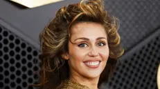 epa11127787 US musician Miley Cyrus arrives for the 66th annual Grammy Awards ceremony at Crypto.com Arena in Los Angeles, California, USA, 04 February 2024.  EPA/CAROLINE BREHMAN