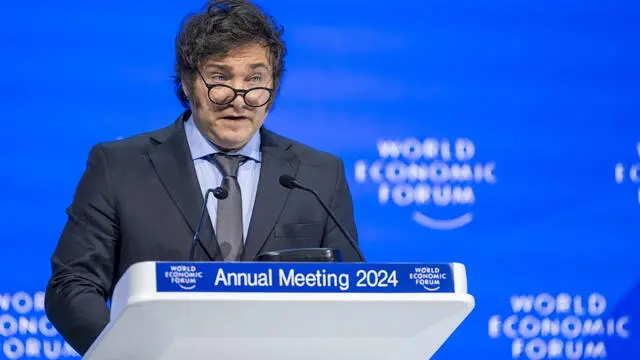 epa11085348 President of Argentina Javier Milei speaks during a plenary session in the Congress Hall as part of the 54th annual meeting of the World Economic Forum (WEF), in Davos, Switzerland, 17 January 2024. The meeting brings together entrepreneurs, scientists, corporate and political leaders in Davos under the topic 'Rebuilding Trust' from 15 to 19 January.  EPA/GIAN EHRENZELLER