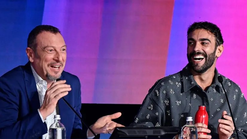 Sanremo Festival host and artistic director Amadeus (L) with Italian singer Marco Mengoni (R) during a press conference at the 74th Sanremo Italian Song Festival, Sanremo, Italy, 06 February 2024. The festival runs from 06 to 10 February 2024. ANSA/RICCARDO ANTIMIANI