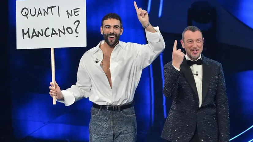 Sanremo Festival host and artistic director Amadeus (R) and Sanremo Festival co-host and Italian singer Marco Mengoni (L) on stage at the Ariston theatre during the 74rd Sanremo Italian Song Festival, Sanremo, Italy, 06 February 2024. The music festival will run from 06 to 10 February 2024.  ANSA/ETTORE FERRARI