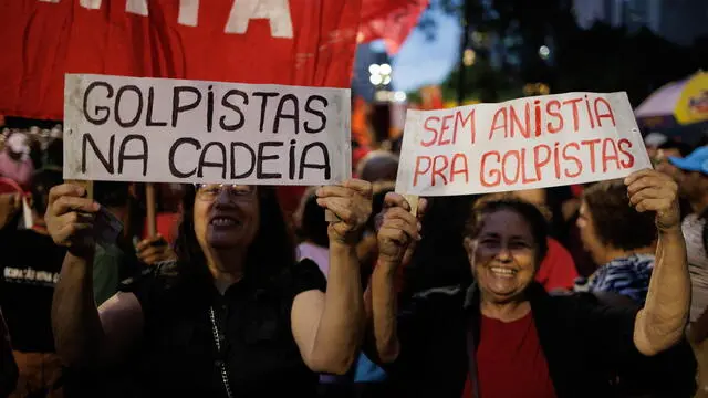 epa11065097 Members of social movements and union centers gather to remember the events that occurred on 8 January 2023 in which followers of former president Jair Bolsonaro, who did not accept the defeat of the far-right at the polls, destroyed the headquarters of Congress, the Supreme Court of Justice and the Planalto Presidential Palace, in Cinelândia, in Sao Paulo, Brazil, 08 January 2024.  On the day of 08 January 2023 followers of former president Jair Bolsonaro, who did not accept the defeat of the far-right at the polls, destroyed the headquarters of Congress, the Supreme Court of Justice and the Planalto Presidential Palace. Brazilian President Luiz Inacio Lula da Silva said on 08 January during the act of defense of democracy after a year of the uprising by far-right extremists, that all those who financed the coup attempt must be 'exemplarily punished'.  EPA/Isaac Fontana