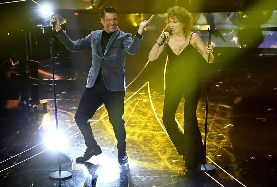 Italian singers Fiorella Mannoia (R) and Francesco Gabbani perform on stage at the Ariston theatre during the 74th Sanremo Italian Song Festival in Sanremo, Italy, 09 February 2024. The music festival runs from 06 to 10 February 2024.   ANSA/RICCARDO ANTIMIANI