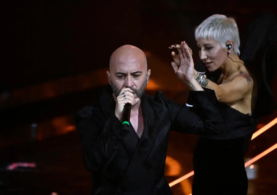 Italian vocalist of Negramaro band, Giuliano Sangiorgi (L) with Italian singer Malika Ayane perform on stage at the Ariston theatre during the 74th Sanremo Italian Song Festival, Sanremo, Italy, 09 February 2024. The music festival will run from 06 to 10 February 2024. ANSA/RICCARDO ANTIMIANI