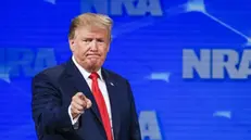 epa07530770 US President Donald J. Trump points to the audience after speaking at the 2019 National Rifle Association (NRA) Annual Leadership Forum at Lucas Oil Stadium in Indianapolis, Indiana, USA, 26 April 2019. The forum is part of the NRA convention where firearms and weapons enthusiasts will view manufacture's exhibits on all things related to firearms, protection, and hunting.  EPA/TANNEN MAURY