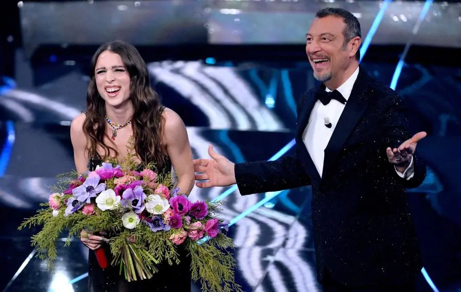 Italian singer Angelina Mango (L) and Sanremo Festival host and artistic director Amadeus on stage at the Ariston theatre during the 74rd Sanremo Italian Song Festival, Sanremo, Italy, 10 February 2024. The music festival will run from 06 to 10 February 2024. ANSA/ETTORE FERRARI