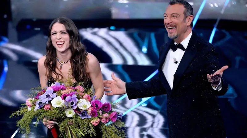 Italian singer Angelina Mango (L) and Sanremo Festival host and artistic director Amadeus on stage at the Ariston theatre during the 74rd Sanremo Italian Song Festival, Sanremo, Italy, 10 February 2024. The music festival will run from 06 to 10 February 2024. ANSA/ETTORE FERRARI