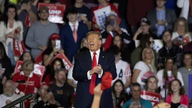 epa11143584 Former President Donald J. Trump speaks during the 'Get Out The Vote' rally and campaign event at Coastal Carolina University in Conway, South Carolina, USA, 10 February 2024. South Carolina is holding its Republican presidential primary on 24 February 2024 and voters will be choosing between Trump and former South Carolina Governor Nikki Haley. EPA/RANDALL HILL