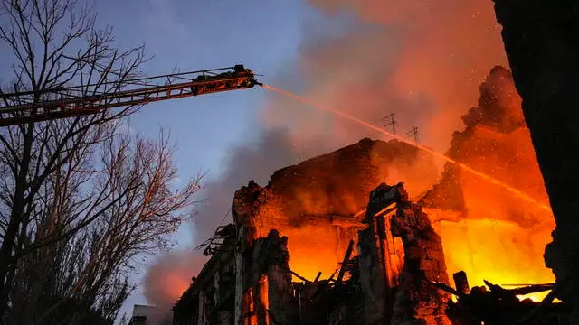 epa10757169 A handout picture made available by the State Emergency Service shows Ukrainian rescuers battling a blaze at a three storey residential building which was damaged after a rocket struck in the city of Mykolaiv, Ukraine, 20 July 2023. The Ukraine Air Force reported on 20 July, that Russia had fired some 19 missiles of different classes and 19 shock drones on many parts of Ukraine. At least 18 people were injured in Mykolaiv, including 5 children, one person killed and four injured in Odesa, according to the State Emergency Service report. The war in Ukraine, which started when Russia entered the country in February 2022, in July marked its 500th day. According to the UN, since the conflict started, more than 9,000 civilians have been killed and more than 6 million others are now refugees worldwide.  EPA/STATE EMERGENCY SERVICE HANDOUT HANDOUT  HANDOUT EDITORIAL USE ONLY/NO SALES HANDOUT EDITORIAL USE ONLY/NO SALES