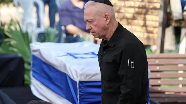 epaselect epa11016836 Israeli Defense Minister Yoav Gallant attends the funeral of Israeli soldier Gal Eizenkot, son of War Cabinet Minister and former IDF Chief of the General Staff Gadi Eizenkot, at the military cemetery in Herzliya, Israel, 08 December 2023. According to the Israeli Defense Forces, Gal Eizenkot was killed in action in the Gaza Strip. More than 16,200 Palestinians and at least 1,200 Israelis have been killed, according to the Palestinian Health Ministry and the Israel Defense Forces (IDF), since Hamas militants launched an attack against Israel from the Gaza Strip on 07 October, and the Israeli operations in Gaza and the West Bank which followed it.  EPA/ABIR SULTAN
