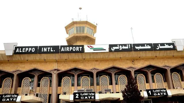 epa04036857 A handout picture made available by the official Syrian Arab News Agency (SANA) shows Aleppo International Airport building after it was reopened, Aleppo, Syria, 22 January 2014. A passenger plane has landed at Aleppo airport in northern Syria, a year after the facility was shut due to the fighting.  EPA/SANA HANDOUT  HANDOUT EDITORIAL USE ONLY/NO SALES