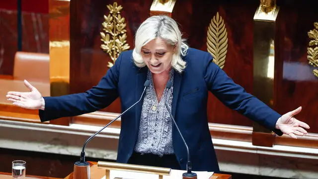 epa10055546  Member of the National Assembly for the far-right Rassemblement National (RN) party Marine Le Pen delivers a speech in Parliament  inside the National Assembly in Paris, France, 06 July 2022. French PM gave her first address to the parliament earlier during which she outlined government policy priorities.  EPA/Mohammed Badra