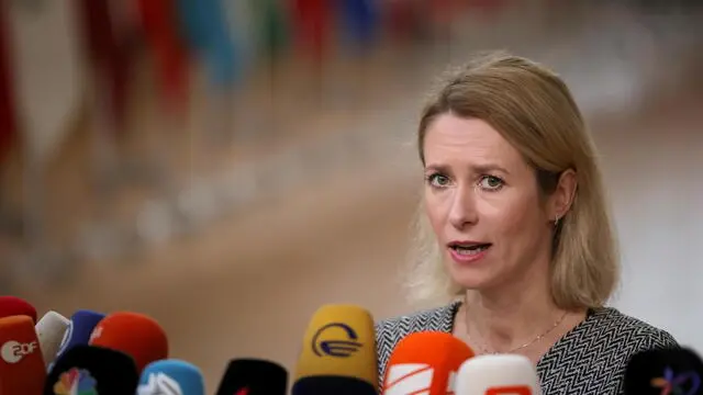 epa11028522 Estonia's Prime Minister Kaja Kallas speaks to the media as she arrives for a European Council in Brussels, Belgium, 14 December 2023. EU leaders are gathering in Brussels for a two-day summit to discuss the latest developments in relation to Russia's invasion of Ukraine, and in the Middle East, including the humanitarian situation in Gaza, the block's enlargement policy and long-term budget 2021-2027, as well as security and defense, among other topics. EPA/OLIVIER MATTHYS