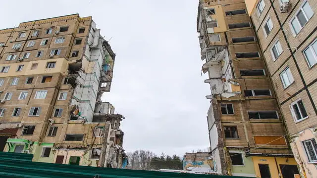 epa11076575 A view of the ruins of a residential building destroyed in a missile strike on 14 January 2023, in Dnipro, southeastern Ukraine, 14 January 2024, amid Russia's invasion. Residents of Dnipro gathered to mark the first anniversary of a Russian missile strike on a nine-story residential building that killed 46 people, including six children, and injured 79 others, including 16 children. Russian troops entered Ukraine territory on 24 February 2022, starting an armed conflict that has provoked destruction and a humanitarian crisis.  EPA/ARSEN DZODZAIEV