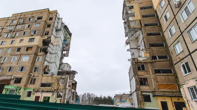 epa11076575 A view of the ruins of a residential building destroyed in a missile strike on 14 January 2023, in Dnipro, southeastern Ukraine, 14 January 2024, amid Russia's invasion. Residents of Dnipro gathered to mark the first anniversary of a Russian missile strike on a nine-story residential building that killed 46 people, including six children, and injured 79 others, including 16 children. Russian troops entered Ukraine territory on 24 February 2022, starting an armed conflict that has provoked destruction and a humanitarian crisis. EPA/ARSEN DZODZAIEV