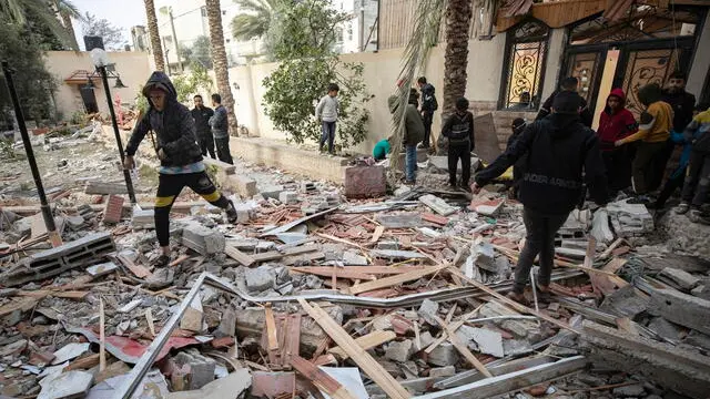 epa11141318 Palestinians from the Ghannam family search for missing people under the rubble after an Israeli air strike targeted their home in the Rafah refugee camp, southern Gaza Strip, 10 February 2024. Israel's Prime Minister Netanyahu on 09 February ordered the Israeli military to present a plan of evacuation of Palestinians from Rafah. Nearly 28,000 Palestinians and over 1,300 Israelis have been killed, according to the Palestinian Health Ministry and the Israel Defense Forces (IDF), since Hamas militants launched an attack against Israel from the Gaza Strip on 07 October 2023, and the Israeli operations in Gaza and the West Bank which followed it.  EPA/HAITHAM IMAD