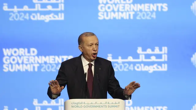 epa11149581 Turkish President Recep Tayyip Erdogan speaks during a session at the World Government Summit in Dubai, United Arab Emirates, 13 February 2024. The World Governments Summit Organization is an international, impartial, nonprofit group whose goal is to influence how governments operate in the future. The summit is held in Dubai between 12-14 February.  EPA/STR