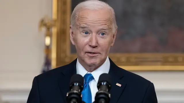epa11150745 US President Joe Biden delivers remarks in the State Dining Room of the White House in Washington, DC, USA, 13 February 2024. President Biden urged the US House of Representatives to pass a 95 billion USD bill with aid to Ukraine, Israel and Taiwan. The package passed with bipartisan support in the Senate but is unlikely to pass in the Republican-controlled House due to opposition from hard-right conservatives supporting former US President Donald J. Trump.  EPA/MICHAEL REYNOLDS / POOL