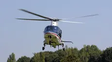 Controlli dei Carabinieri con elicottero, pattuglie a piedi, in auto e motociclisti all'Idroscalo e sulla sua circonvallazione a Segrate e Peschiera Borromeo, 20 agosto 2020. ANSA/ ANDREA CANALI