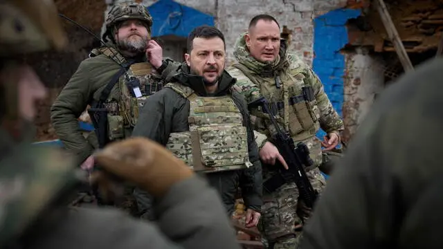 epa11126083 A handout photo made available by the Ukrainian Presidential Press Service shows Ukraine's President Volodymyr Zelensky (C) during a visit to frontline positions near Robotyne village, Zaporizhzhia region, southeastern Ukraine, 04 February 2024, amid the Russian invasion. According to the presidential office, Zelensky, during a working trip to the Zaporizhzhia region, visited Ukrainian soldiers near the frontline village of Robotyne and handed them state awards. Russian troops entered Ukrainian territory on 24 February 2022, starting a conflict that has provoked destruction and a humanitarian crisis.  EPA/UKRAINIAN PRESIDENTIAL PRESS SERVICE HANDOUT -- MANDATORY CREDIT: UKRAINIAN PRESIDENTIAL PRESS SERVICE --  HANDOUT EDITORIAL USE ONLY/NO SALES HANDOUT EDITORIAL USE ONLY/NO SALES