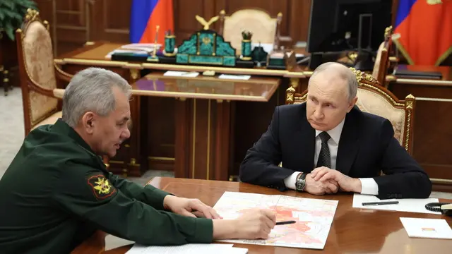 epa11168275 Russian President Vladimir Putin (R) listens to Russian Defence Minister Sergei Shoigu during a meeting at Kremlin, in Moscow, Russia, 20 February 2024. The losses of the Ukrainian armed forces during the counter-offensive in 2023 amounted to over 166 thousand military personnel, more than 800 tanks, and almost 2.4 thousand armored combat vehicles, said Russian Defense Minister Sergei Shoigu. Vladimir Putin called the capture of Avdeevka by Russian Forces a success.  EPA/ALEXANDER KAZAKOV/SPUTNIK/KREMLIN POOL MANDATORY CREDIT