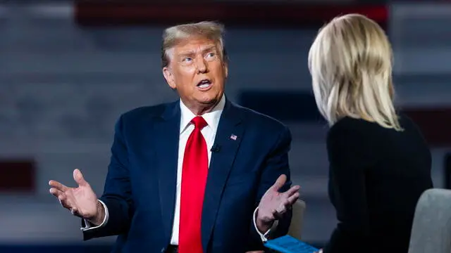 epa11168817 Former US President and current Republican presidential candidate Donald Trump (L) speaks to Fox News host Laura Ingraham (R) during a Fox News town hall in Greenville, South Carolina, USA, 20 February 2024. Trump is running against former South Carolina governor Nikki Haley in the South Carolina Republican presidential primary, scheduled for 24 February 2024.  EPA/JIM LO SCALZO