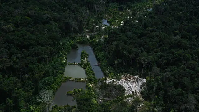 epa10469281 Aerial view of illegal mines in the Altamira Environmental Forest, during an operation by the Brazilian authorities against deforestation and illegal mining, near Itaituba, Brasil, 14 February 2023 (issued 15 February 2023). The Brazilian authorities deployed a major operation against the advance of deforestation and illegal mining in one of the most conflictive areas of the Amazon, official sources reported on 15 February. The action takes place in the surroundings of Itaituba, state of Para, one of the areas of the jungle most affected by deforestation. EPA/ANDRE BORGES