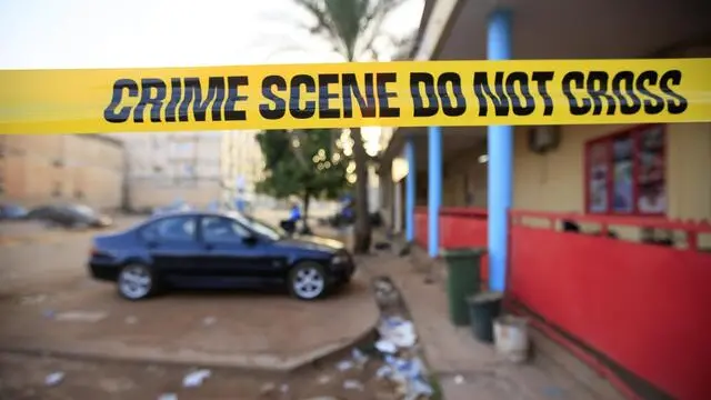 epa06577760 Burkinabe police sealed off an area around the army headquarters after an alleged terrorist attacks in the capital Ouagadougou, Burkina Faso, 03 March 2018. According to reports at least 28 people have been killed and dozens left wounded in the attacks on the French Embassy and miltary headquarters in Ouagadougou. EPA/LEGNAN KOULA